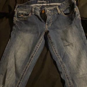 Amethyst boot cut  with holes in the knees